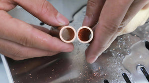 Pure copper piece cut with the ToAuto smart metal cutting saw, showing a clean precise edge for copper fabrication
